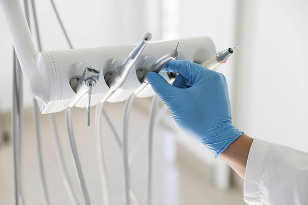 Professional Tooth Extraction technician working in McAllen, TX